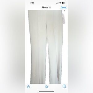 Mariuccia Woman’s flared pant. Size Large . Inseam 33.NWT . Crème colored pant .